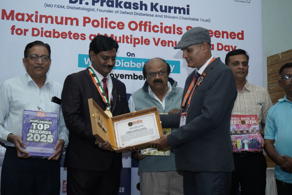 Dr. Prakash Kurmi and officials receiving a World Record certificate for screening the maximum number of police officials for diabetes.