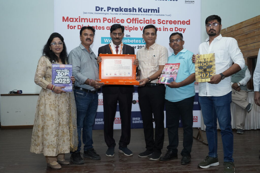 Group photo of Dr. Prakash Kurmi and team holding the World Record certificate for maximum police diabetes screening.